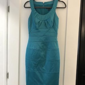 Fitted knee length turquoise cocktail dress
